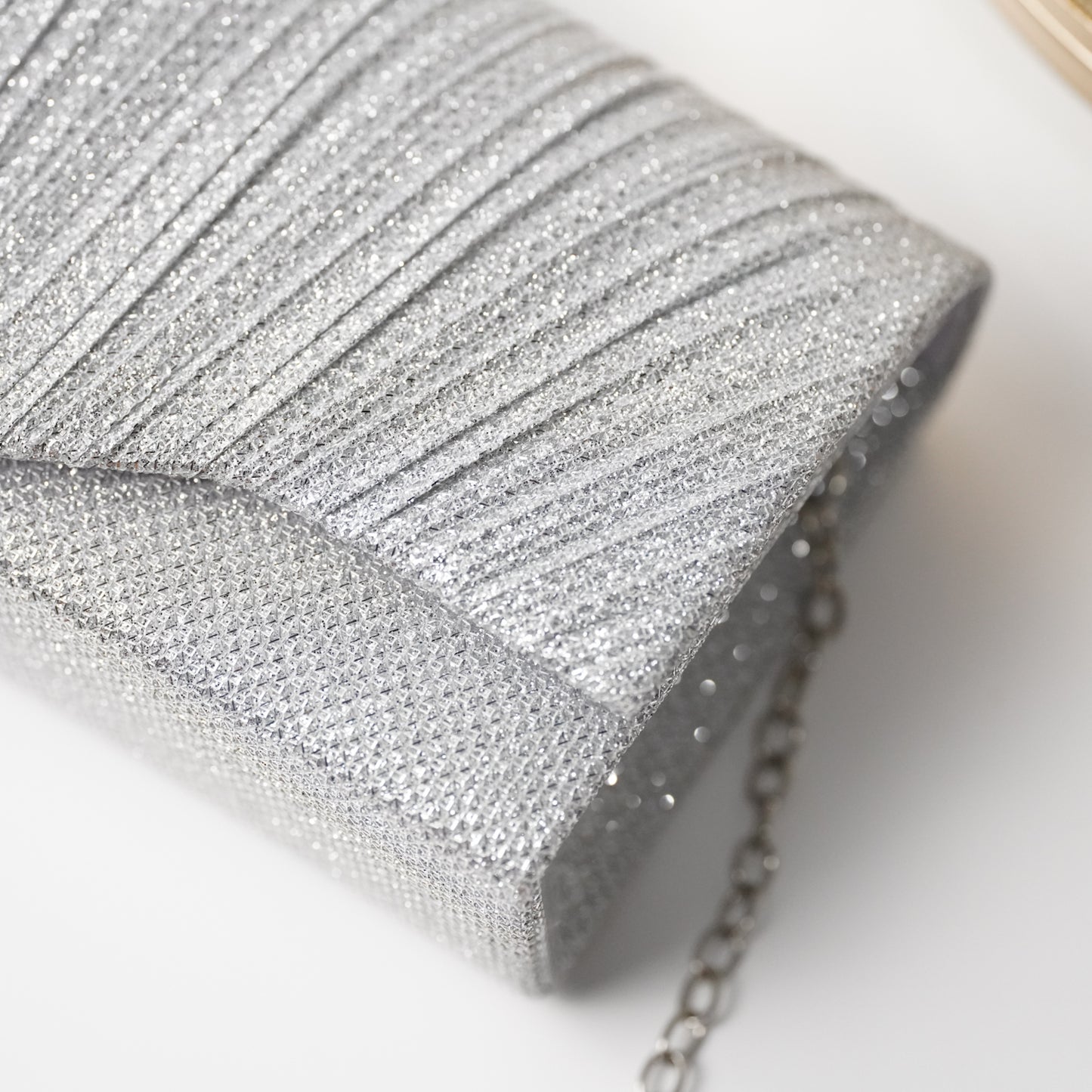 حقيبة سهرة نقشة الصدف فضي