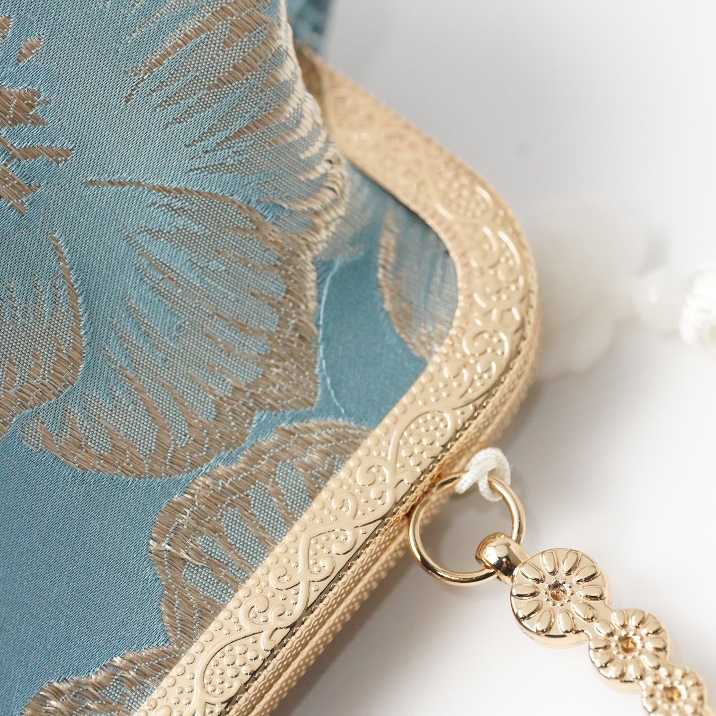 حقيبة سهرة تطريز الورد التراكواز