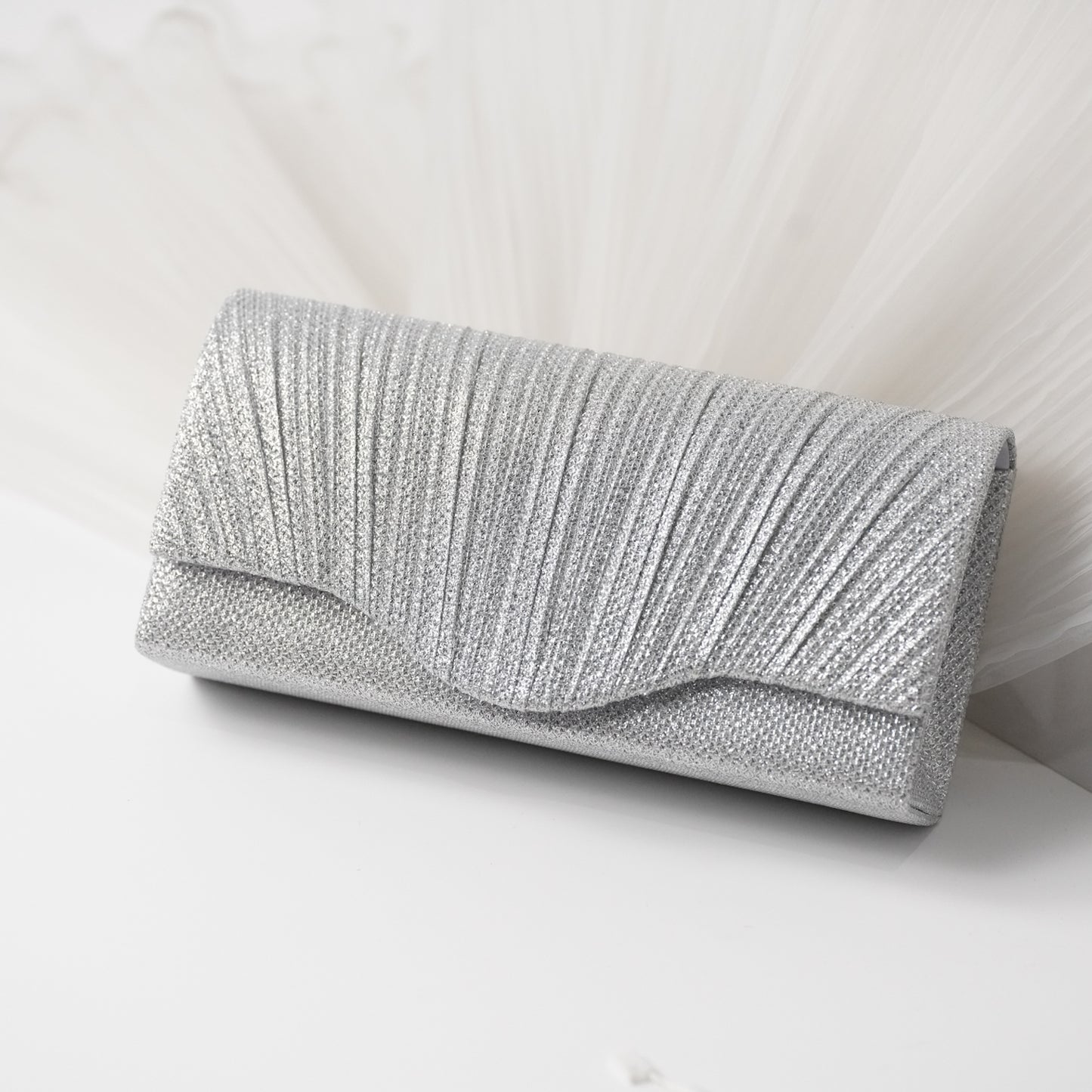 حقيبة سهرة نقشة الصدف فضي