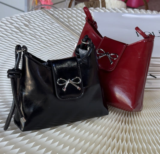 حقيبة فيونكة جلد مرن حجم وسط